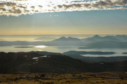 The view from the car park at the top of the Bealach na Ba with the Cuillins on Skye clearly visible.