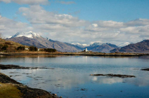 A snow-covered Beinn Sgritheall as seen from Isleornsay on the Sleat peninsula, Isle of Skye.